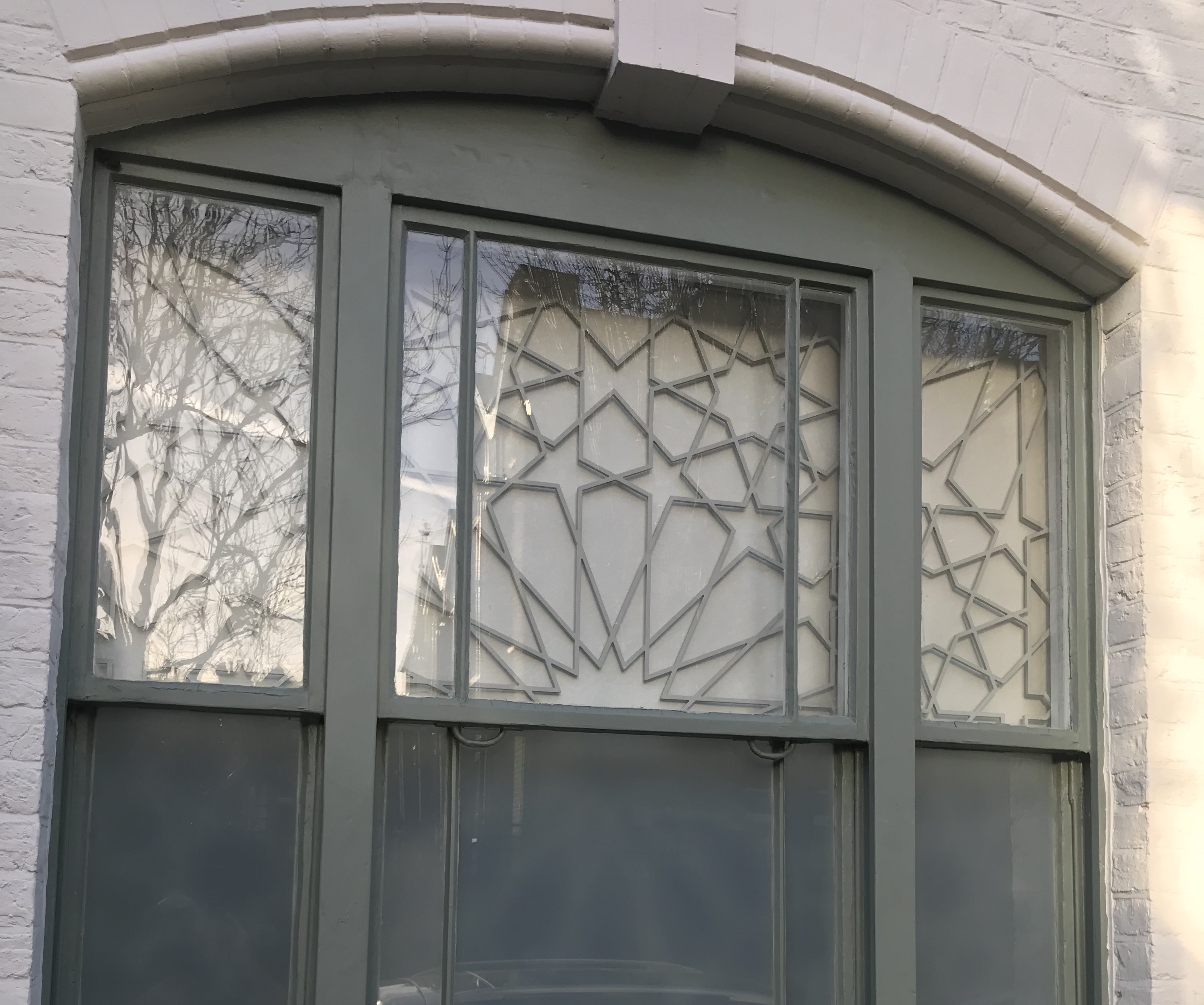 Islamic geometric metal screens in Camden, London